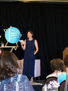 Brooke Warner Speaking in front of crowd at workshop